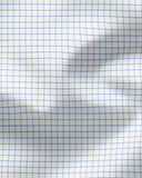 Close-up of light blue and white graph-check shirt fabric