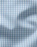 Close-up of the shirt's sky blue and white gingham poplin fabric